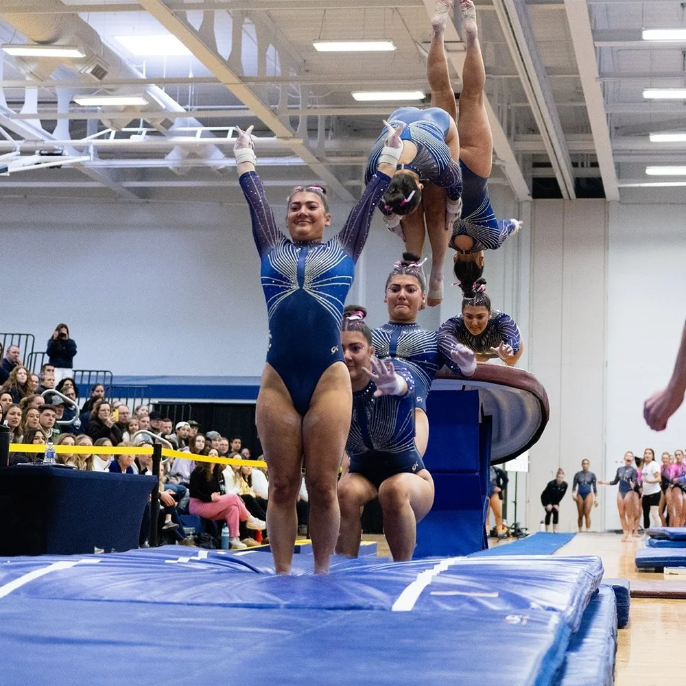 Multi-exposure edit of an Ithaca College gymnast on vault.